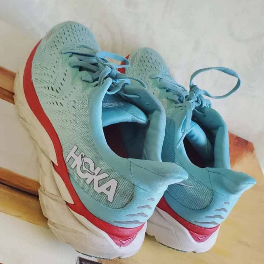 Hoka Light Blue with Red Accents Running Shoes Size 11B.